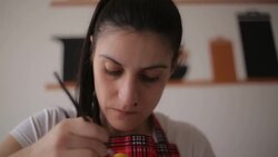 young woman draws Easter eggs Stock Footage