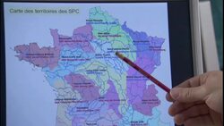 A technician indicates points on a map. Stock Footage