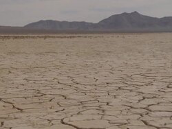  WS Landscape with cracks on arid desert / Mojave, California, USA Stock Footage