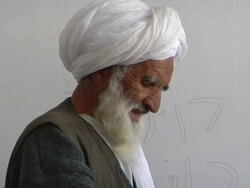 CU TD Senior man teaching children / Mausa Qala, Helmand Province, Afghanistan. Stock Footage