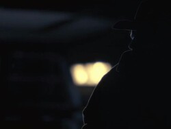 CU Cowboy breathing in dark shadow at night / Tejon Ranch, California, USA Stock Footage