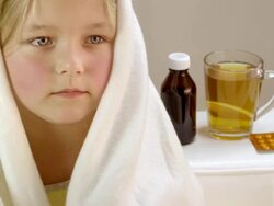 Little girl lying sick in her bed, drinking hot tea. Stock Footage