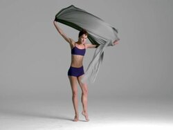 slow motion of ballerina dancing with silk fabric Stock Footage