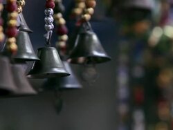 CU Decorations hanging on market stall / Singapore Stock Footage