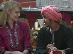Young woman talking with a indian boy, Suraj Kund, Faridabad, Haryana, India Stock Footage