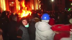 Pro-Russian protesters set tires and plastic barriers on fire in front of the regional assembly building in Kharkiv in eastern Ukraine on Monday night. (April 7) News Clip