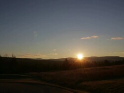 WS View of Sun setting over mountains / Greensboro, Vermont, United States Stock Footage