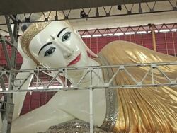 MS Shot of Huge Buddha statue inside temple / Yangon, Yangon Division, Myanmar  Stock Footage