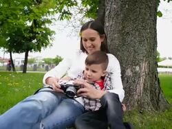 mother with son watching pictures Stock Footage