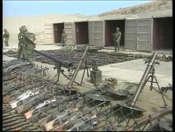NLA weapons are destroyed at NATO base Instructional Video