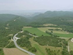 WS AERIAL View over Landscape and road near Aleyrac / Rhone Alpes, France Stock Footage