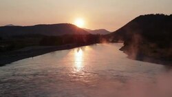 Winter morning view of a reservoir in North America Stock Footage
