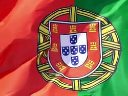 ECU SLO MO Shot of Portuguese Flag Waving in Wind / Caen, Normandy, France Stock Footage