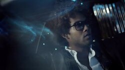 Hip-hop star waits in limousine as cameras flash outside at awards show Stock Footage