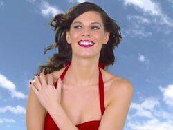 Beautiful young woman against sky background Stock Footage