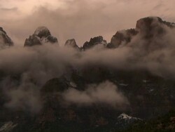 Ominous storm clouds over the Towers of the Virgin and The Sundial at Zion National Park Stock Footage