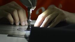 Tailoring Process - Woman sewing in industry Stock Footage