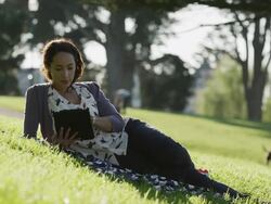 USA, California, San Francisco, Alamo Square Park, Mid adult woman with digital tablet in park Stock Footage