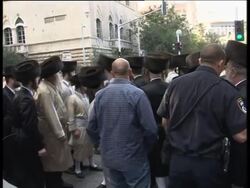 Ultra-Orthodox Jews clash with police over parking lot News Clip