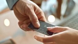 SLO MO TU person giving the credit card to the salesperson Stock Footage