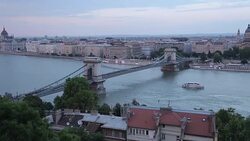 Hungarian Parliament, Chain Bridge Szechenyi Lamchid, & River Danube from Castle Hill District, Budapest, Hungary, Europe Stock Footage