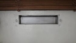 Close up of the new mail arrives through mailslot Stock Footage