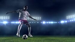 Soccer player dribbling a ball on the field Stock Footage