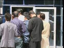 Concerned residents withdraw money from troubled bank News Clip