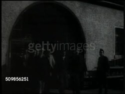 1946: FRENCH ZONE, GERMANY: EXT French headquarters in Allemagne. Meeting in progress at conference table. Military Governor Marie Pierre Koenig (1898-1970) head of table. German prisoners walking, prison inspection.   (poor quality, too dark) Instructional Video