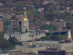 WS AERIAL PAN ZI ZO Golden domed capitol building in Hartford / Connecticut, United States Stock Footage
