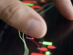 Touching stock market graph. Stock Footage