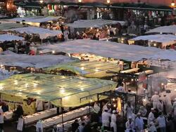 People eating at the famous food Stalls in the DjemmaÃ‚Â  El- FnaÃ‚Â  Square, Marrakech, Morocco, Africa Stock Footage