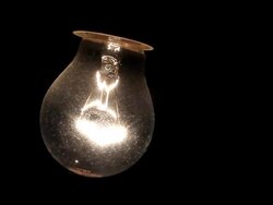 Dusted blinking light bulb Stock Footage