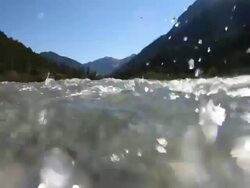HD Surface level view of a mountain river Stock Footage