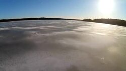 Flying over Frozen Lake Stock Footage
