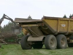 MS Shot of Tractors and chipping machine / Cranbrook, Kent, United Kingdom Stock Footage