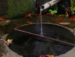 MS Shot of Traditional fountain at small mountainside shrine in Minakami rural area Stock Footage