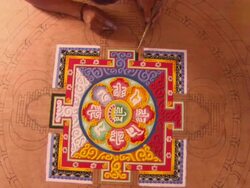 MS ZI ZO PAN Details being filled in on Buddhist mandala sand painting  / Kathmandu, Central, Nepal Stock Footage