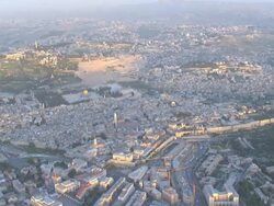 Aerial the church of the Holy Sepulchre in the old city of Jerusalem, Israel Stock Footage