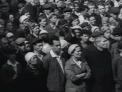 MS Large crowds of civilians listening to Stalin's public address through loudspeakers announcing Russia at war AUDIO / Russia Stock Footage