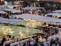 People eating at the famous food Stalls in the DjemmaÃ‚Â  El- FnaÃ‚Â  Square, Marrakech, Morocco, Africa Stock Footage