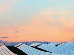HD Solar Power Plant at Dusk (Panning) Stock Footage