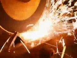 Close-up of a machine cutting iron in a factory  Stock Footage