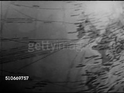 1953: HAWAII: CU Map of Europe on globe, turning past United States to Hawaiian Islands. 'Hawaii' superimposed on map. Instructional Video