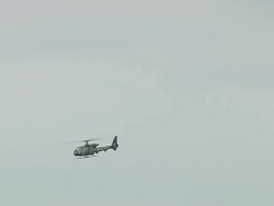 WS AERIAL TS Shot of Gazelle Military Helicopter flying in sky / Rhone Alpes, France Stock Footage