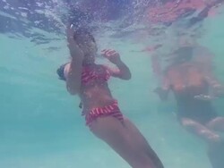 Little Girl Ducking Underwater Stock Footage