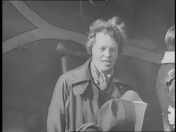 Ameila Earhart speaks to a crowd after crossing the Pacific ocean. News Clip