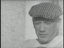Pablo Picasso talks outdoors. News Clip