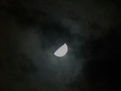 Moon closeup with clouds 2 Stock Footage