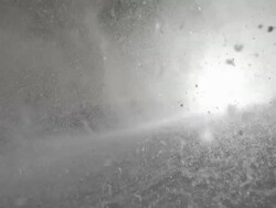 HD Super Slow-Mo: Snow Spraying At Camera Stock Footage